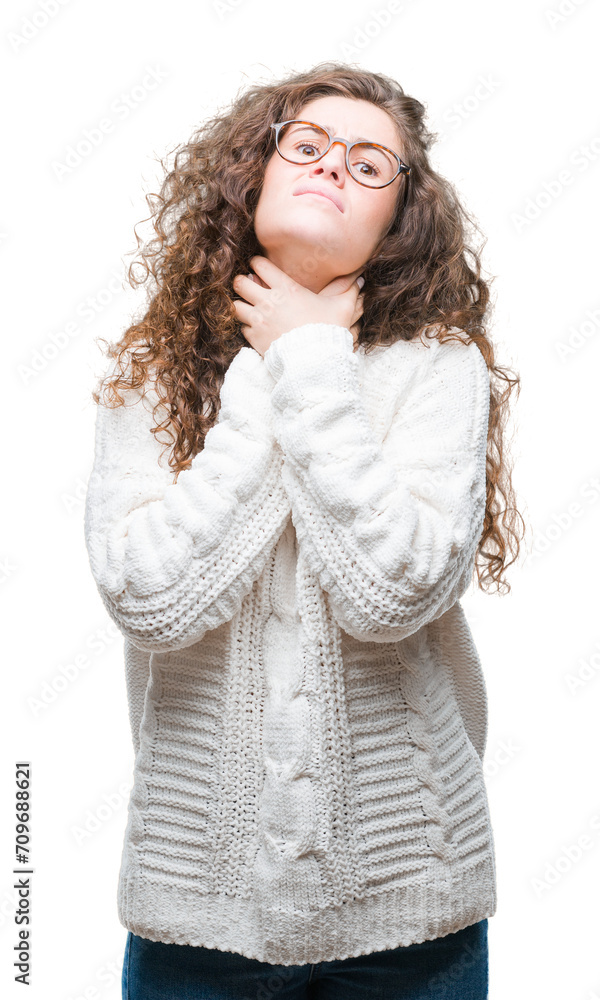 Beautiful brunette curly hair young girl wearing winter sweater over isolated background shouting and suffocate because painful strangle. Health problem. Asphyxiate and suicide concept. Beautiful brunette curly hair young girl wearing winter sweater over isolated background shouting and suffocate because painful strangle. Health problem. Asphyxiate and suicide concept.