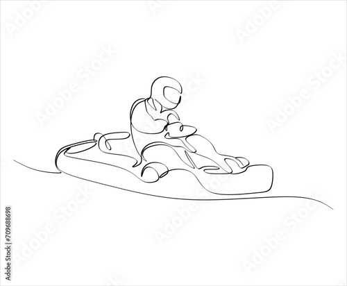 Competitive person having fun on go kart track. Go kart track and driver for car racing to have fun in the city.