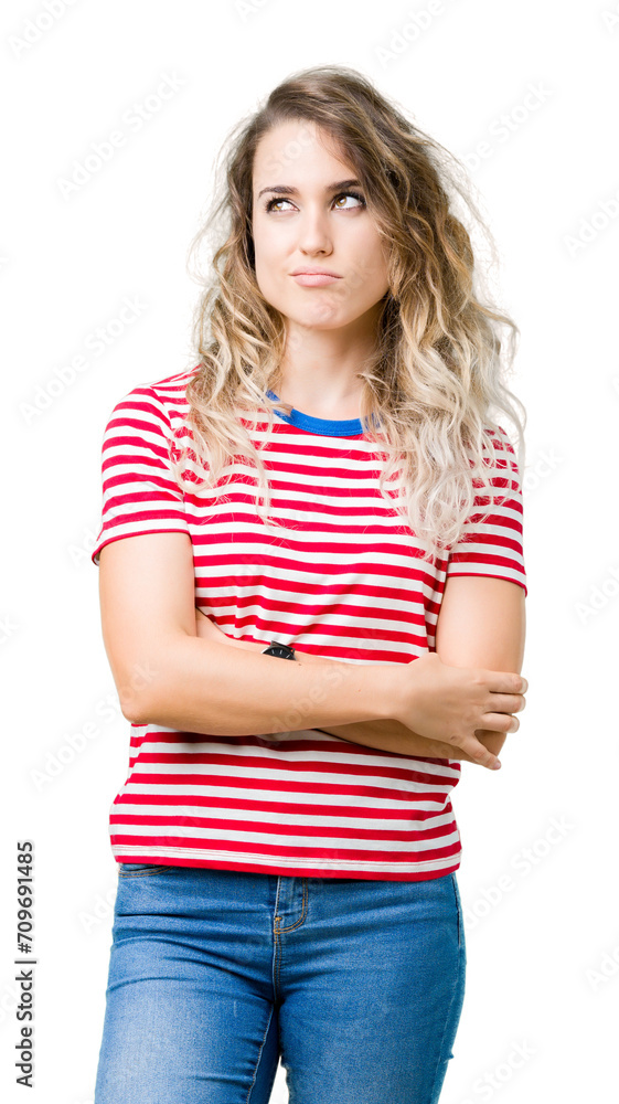 Beautiful young blonde woman over isolated background smiling looking side and staring away thinking. Beautiful young blonde woman over isolated background smiling looking side and staring away thinking.