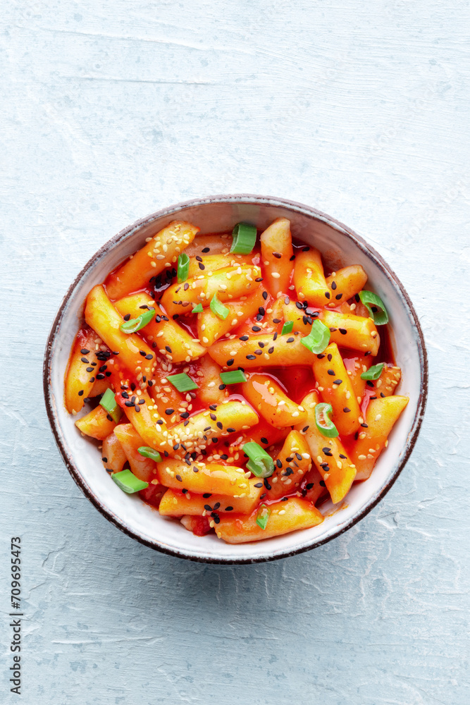 Tteokbokki or topokki, Korean street food, spicy rice cakes in red ...