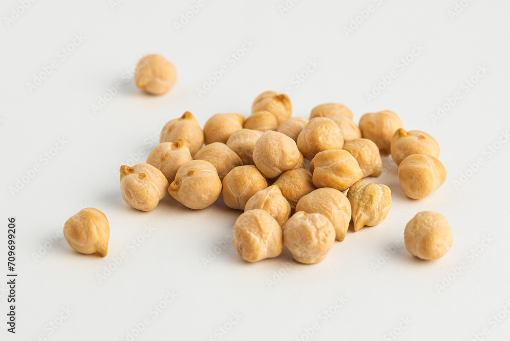 Heap of chickpeas on white background, some of chickpeas isolated Heap of chickpeas on white background, some of chickpeas isolated