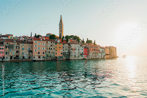 Scenic view of the colorful houses on the coastline in Rovinj, Croatia at golden sunset