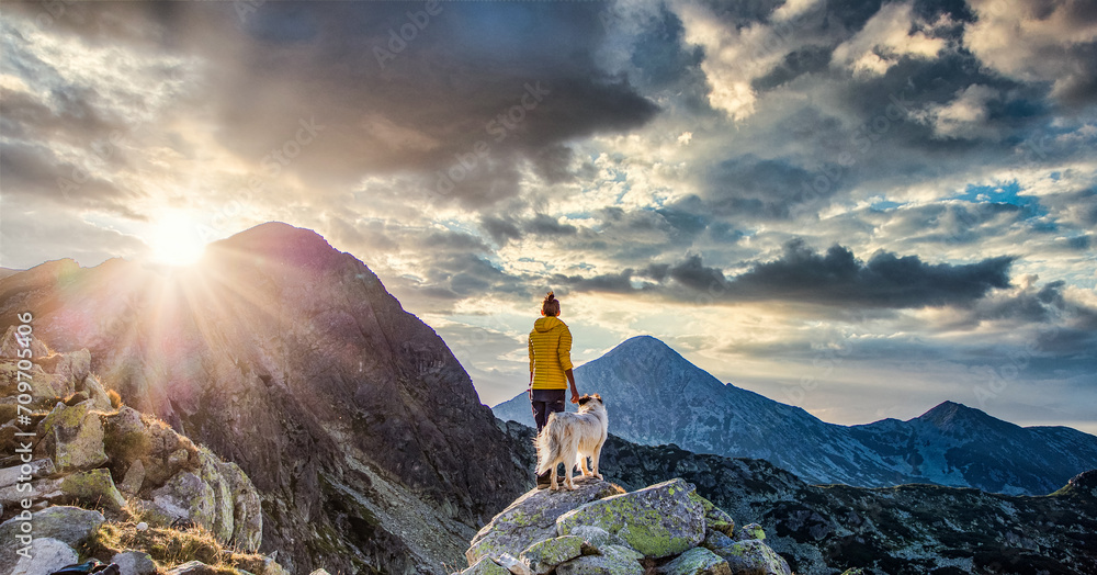 woman with white dog sitting on mountain top in summer landscape slow travel and freedom concept - obrazy, fototapety, plakaty 