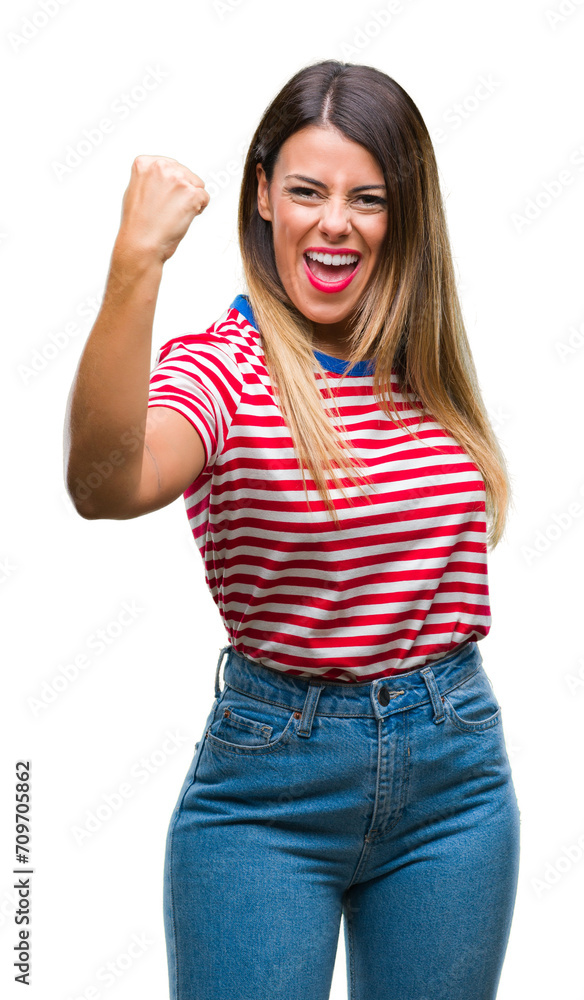 Young beautiful woman casual look over isolated background angry and mad raising fist frustrated and furious while shouting with anger. Rage and aggressive concept. Young beautiful woman casual look over isolated background angry and mad raising fist frustrated and furious while shouting with anger. Rage and aggressive concept.