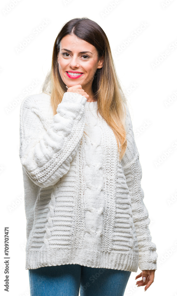 Young beautiful woman casual white sweater over isolated background looking confident at the camera with smile with crossed arms and hand raised on chin. Thinking positive.