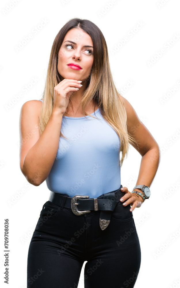 Young beautiful elegant business woman over isolated background with hand on chin thinking about question, pensive expression. Smiling with thoughtful face. Doubt concept. Young beautiful elegant business woman over isolated background with hand on chin thinking about question, pensive expression. Smiling with thoughtful face. Doubt concept.