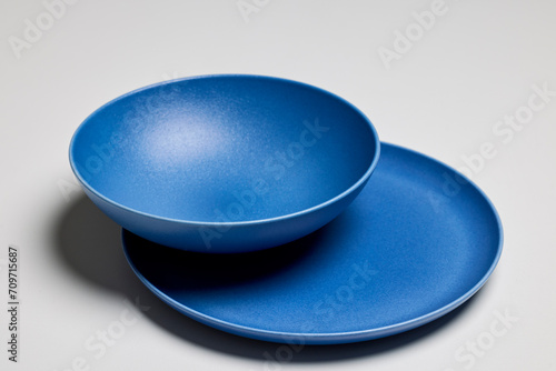 set of modern plates on a table.