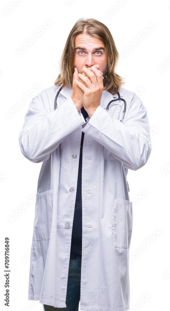 Young handsome doctor man with long hair over isolated background shocked covering mouth with hands for mistake. Secret concept. Young handsome doctor man with long hair over isolated background shocked covering mouth with hands for mistake. Secret concept.