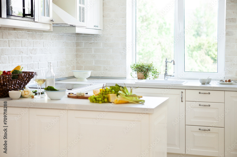 Classical white kitchen with healthy food Classical white kitchen with healthy food