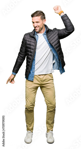 Handsome man wearing winter coat Dancing happy and cheerful, smiling moving casual and confident listening to music