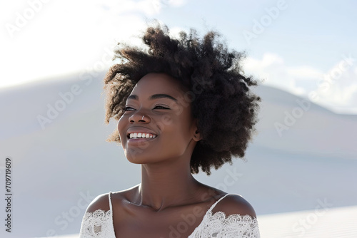 Stock photography of a black African American woman. Mind. Launching, blue sky background photo