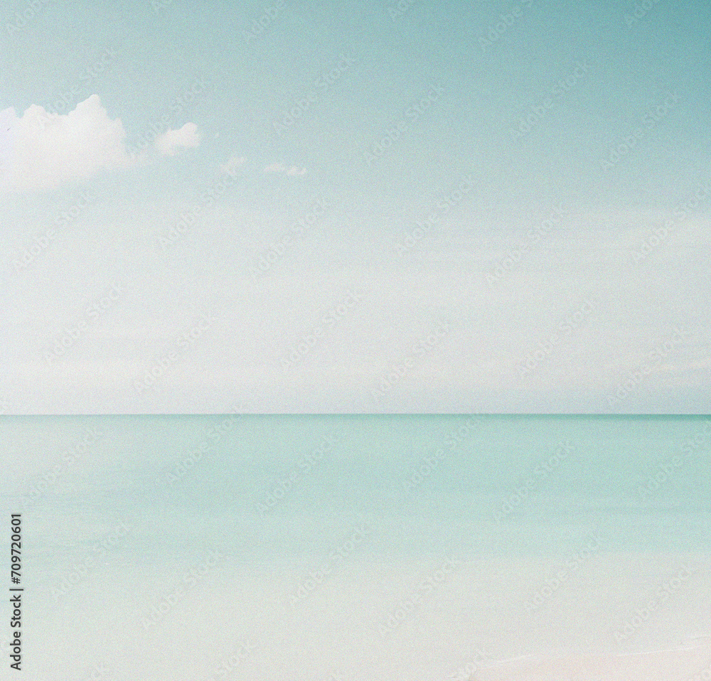 Fototapeta premium Sea and blue sky. Empty summer vacation background. Banner with copy space. Minimalist Wallpaper. Beautiful backdrop for presentation or product. Travel, holiday concept. Minimal flyer or card design