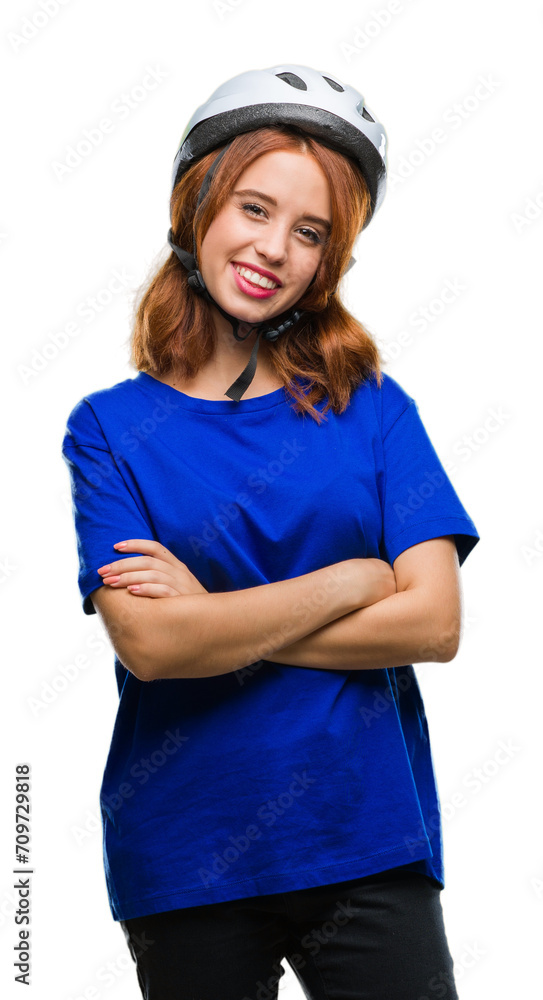 Young beautiful woman wearing cyclist helmet over isolated background happy face smiling with crossed arms looking at the camera. Positive person. Young beautiful woman wearing cyclist helmet over isolated background happy face smiling with crossed arms looking at the camera. Positive person.