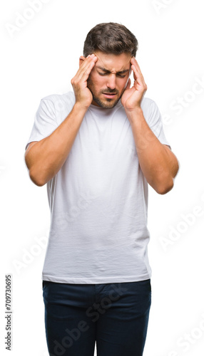 Young handsome man over isolated background with hand on head for pain in head because stress. Suffering migraine.