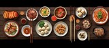 various foods are neatly arranged on the wooden table