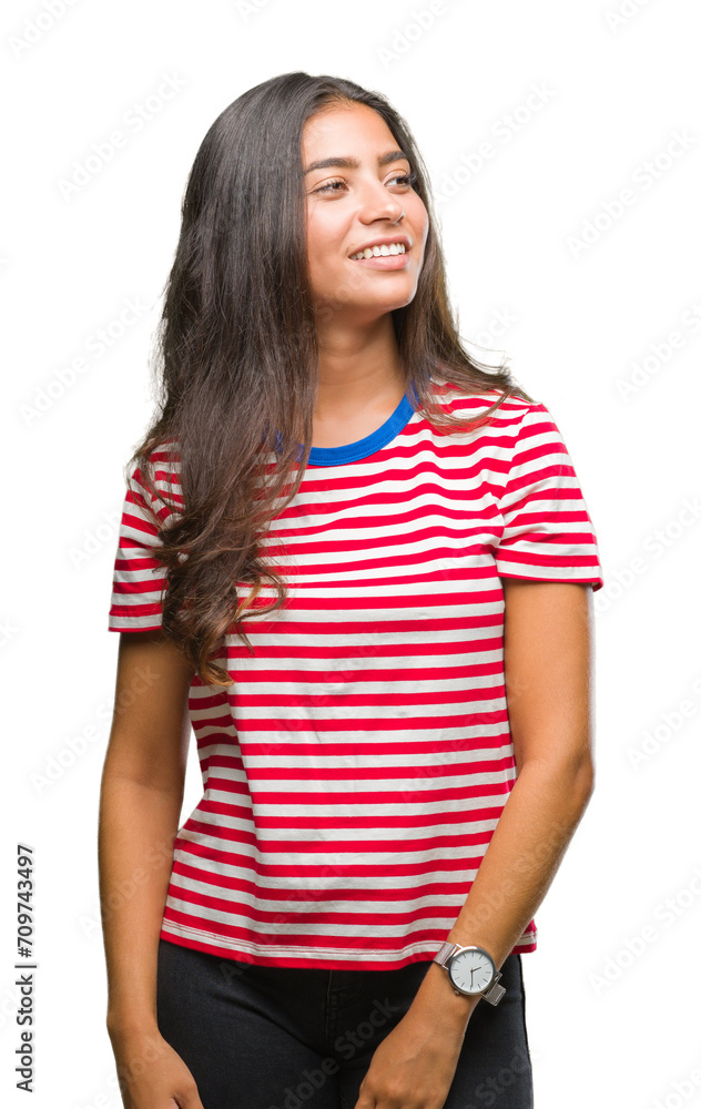 Young beautiful arab woman over isolated background looking away to side with smile on face, natural expression. Laughing confident. Young beautiful arab woman over isolated background looking away to side with smile on face, natural expression. Laughing confident.
