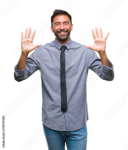 Adult hispanic business man over isolated background showing and pointing up with fingers number ten while smiling confident and happy. © Krakenimages.com