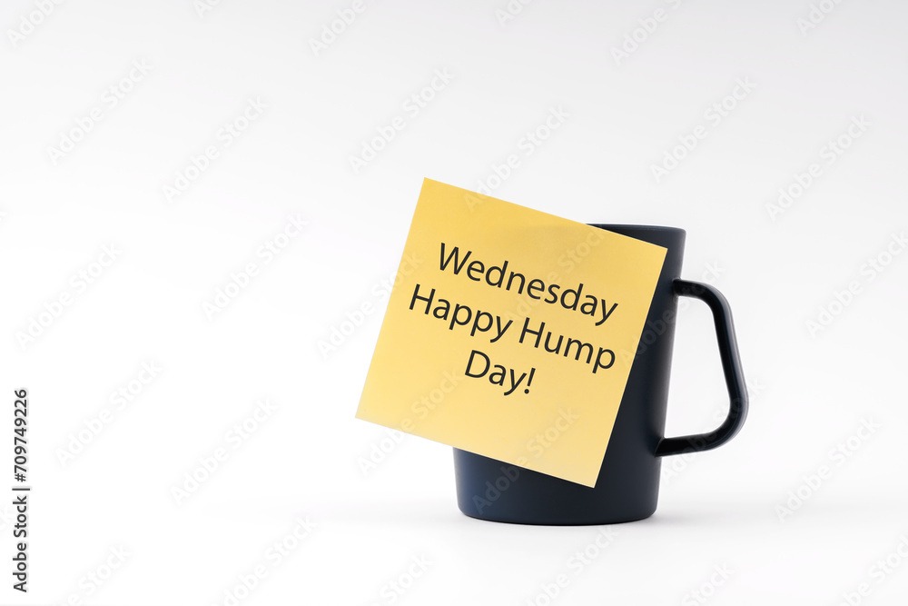 Adhesive note with text Wednesday Happy Hump Day stick on a cup of drink on white background Adhesive note with text Wednesday Happy Hump Day stick on a cup of drink on white background