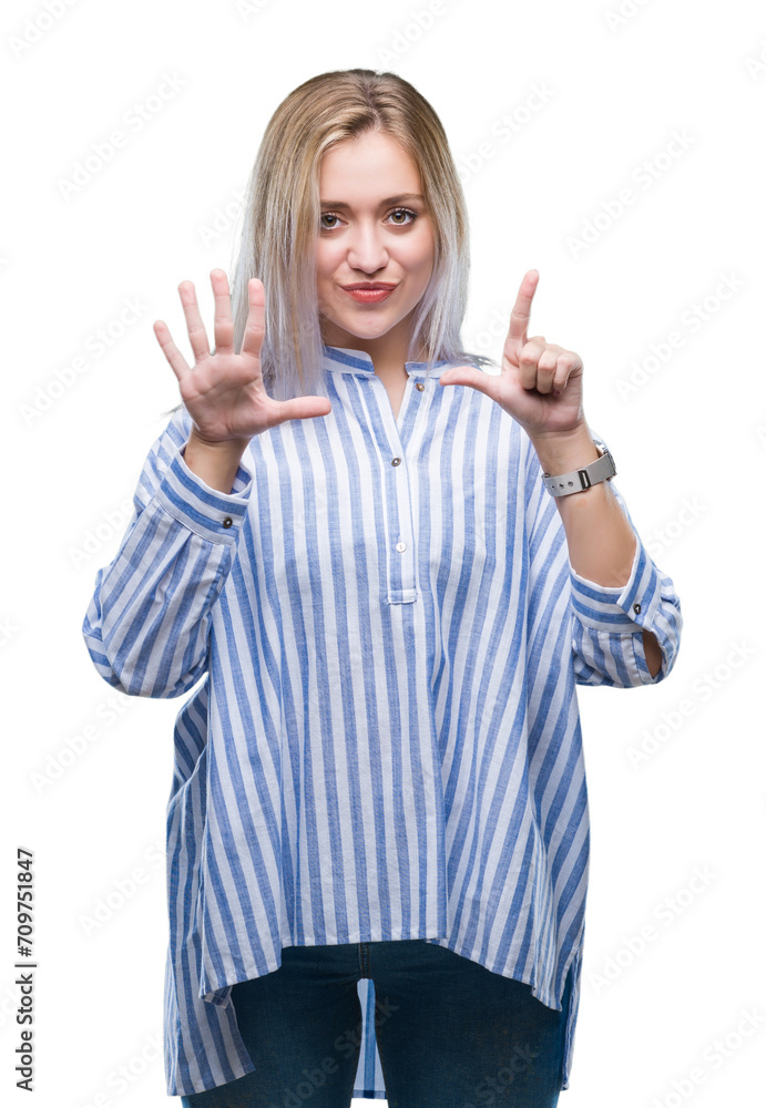 Young blonde woman over isolated background showing and pointing up with fingers number seven while smiling confident and happy. Young blonde woman over isolated background showing and pointing up with fingers number seven while smiling confident and happy.