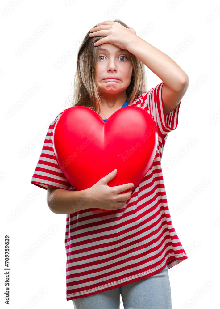 Young beautiful girl holding red heart over isolated background stressed with hand on head, shocked with shame and surprise face, angry and frustrated. Fear and upset for mistake. Young beautiful girl holding red heart over isolated background stressed with hand on head, shocked with shame and surprise face, angry and frustrated. Fear and upset for mistake.
