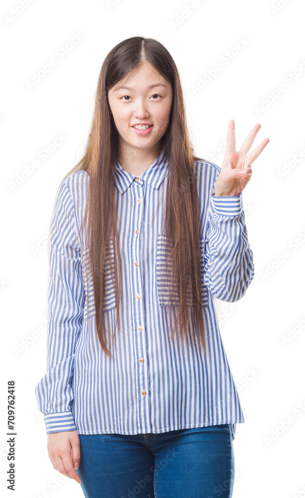 Young Chinese woman over isolated background showing and pointing up with fingers number three while smiling confident and happy. Young Chinese woman over isolated background showing and pointing up with fingers number three while smiling confident and happy.