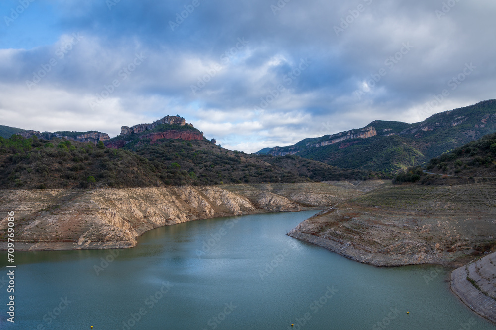 View of the Siurana reservoir, Catalonia, almost empty due to the drought, horizontally