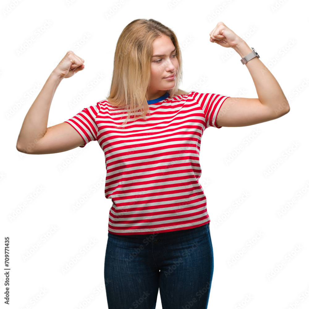 Obraz premium Young caucasian woman over isolated background showing arms muscles smiling proud. Fitness concept.