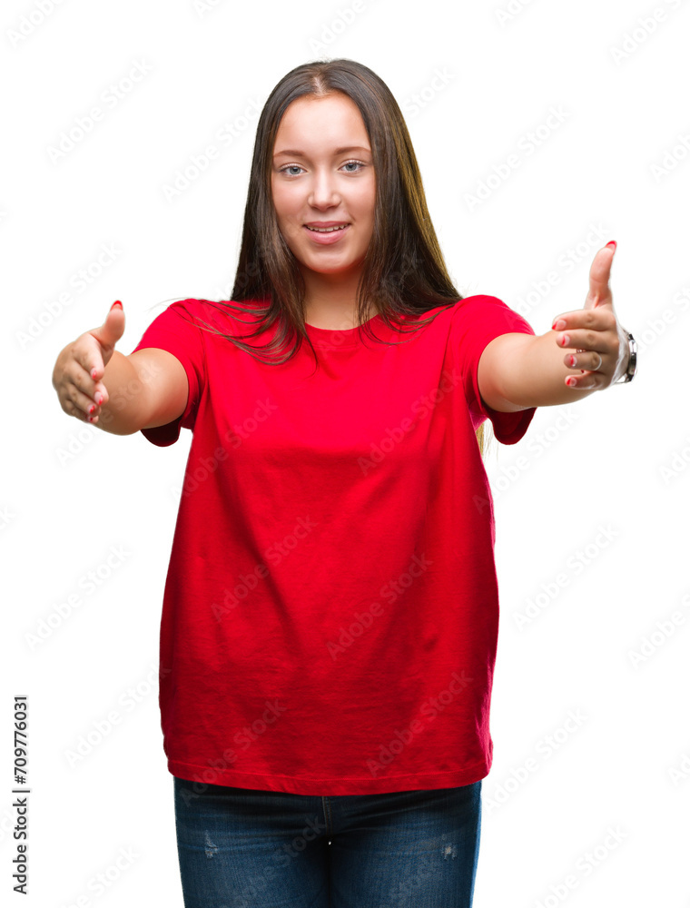 Young beautiful caucasian woman over isolated background looking at the camera smiling with open arms for hug. Cheerful expression embracing happiness. Young beautiful caucasian woman over isolated background looking at the camera smiling with open arms for hug. Cheerful expression embracing happiness.