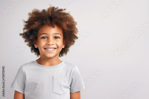 Happy young boy with afro hairstyle portrait. Generative ai design.