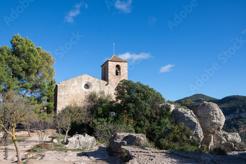 View of the Church of Santa Maria in Siurana, Tarragona, with blue sky, horizontal