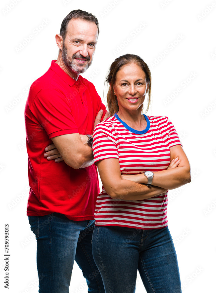 Middle age hispanic couple in love over isolated background happy face smiling with crossed arms looking at the camera. Positive person. Middle age hispanic couple in love over isolated background happy face smiling with crossed arms looking at the camera. Positive person.