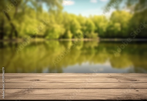 Wooden table top with natural green background of blurred lake