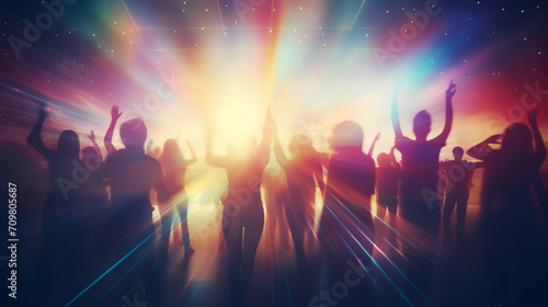 people having fun in a disco. blur effect for an artistic touch © alexkich