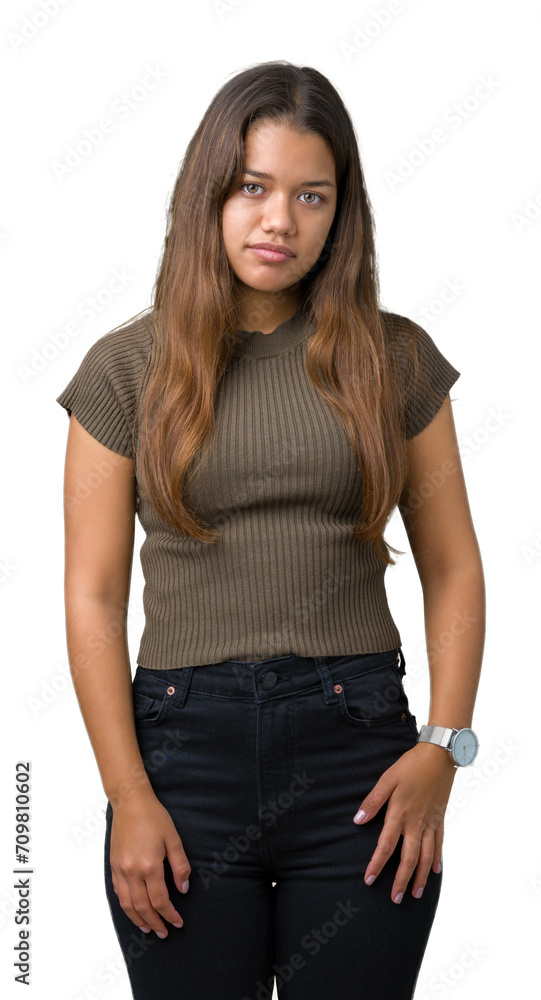 Young beautiful brunette woman over isolated background skeptic and nervous, frowning upset because of problem. Negative person. Young beautiful brunette woman over isolated background skeptic and nervous, frowning upset because of problem. Negative person.