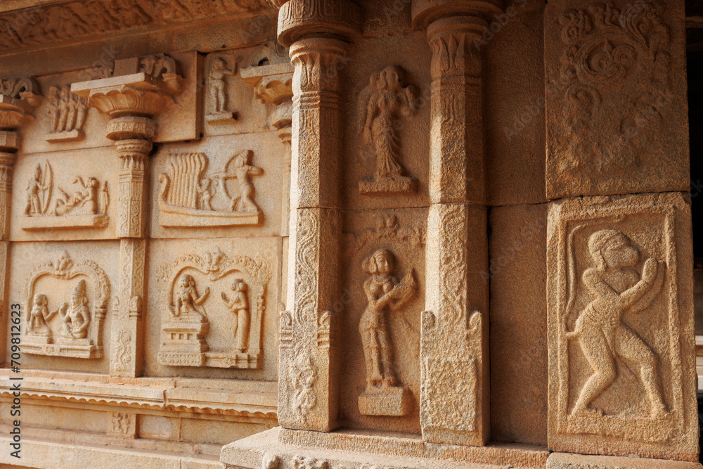 Carvings of Hanuman and a naked woman on the exterior wall of the Hazararama temple, Hampi, Karnataka, India, Asia