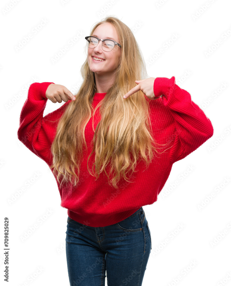 Blonde teenager woman wearing red sweater looking confident with smile on face, pointing oneself with fingers proud and happy. Blonde teenager woman wearing red sweater looking confident with smile on face, pointing oneself with fingers proud and happy.