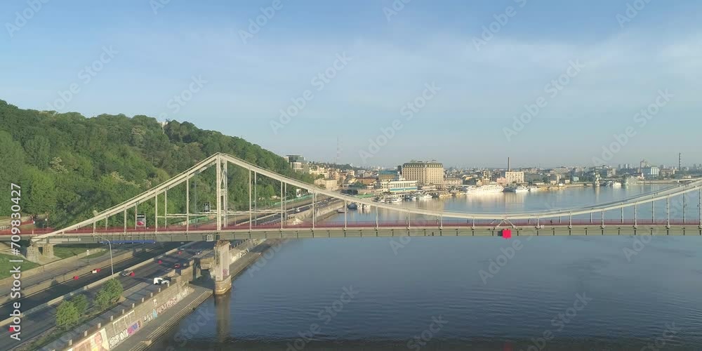 Kyiv pedestrian bridge across river Dnipro. Travel landmark, urban cityscape landscape, pedestrian downtown, aerial kiev Kyiv pedestrian bridge across river Dnipro. Travel landmark, urban cityscape landscape, pedestrian downtown, aerial kiev