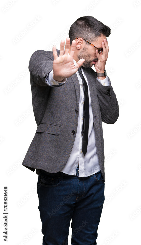 Young handsome business man over isolated background covering eyes with hands and doing stop gesture with sad and fear expression. Embarrassed and negative concept. Young handsome business man over isolated background covering eyes with hands and doing stop gesture with sad and fear expression. Embarrassed and negative concept.