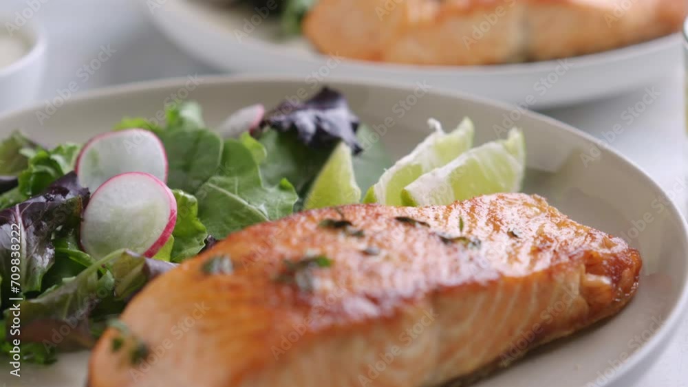 Grilled salmon fillet and fresh vegetable salad. Mediterranean diet. Grilled salmon fillet and fresh vegetable salad. Mediterranean diet.