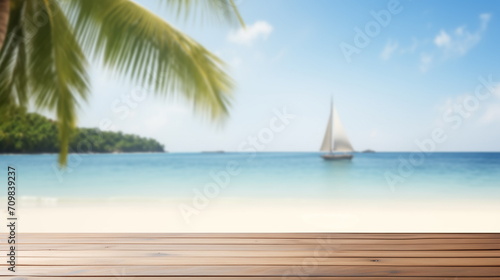 Empty wooden tabletop with sea and sunny beach background. Copy space 