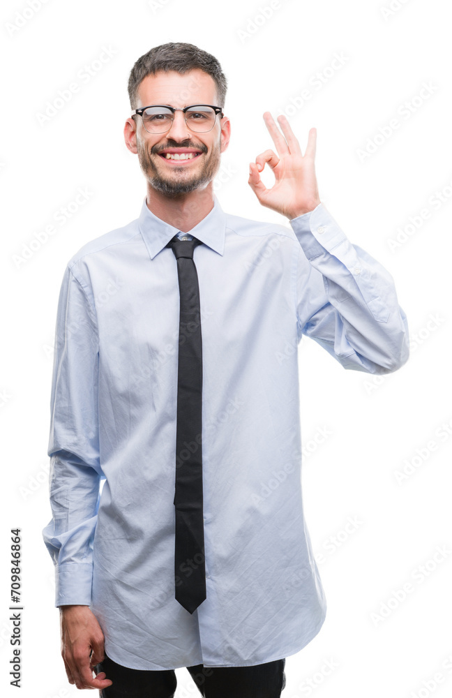 Young business man doing ok sign with fingers, excellent symbol Young business man doing ok sign with fingers, excellent symbol