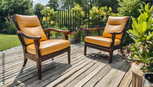 classic scandinavian mid century modern wood and leather chairs. scandynavian backyard terrace photo