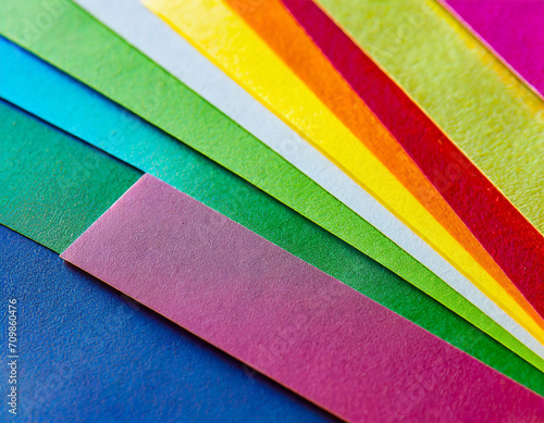 Extreme macro of multicolor background from different colors papers.
