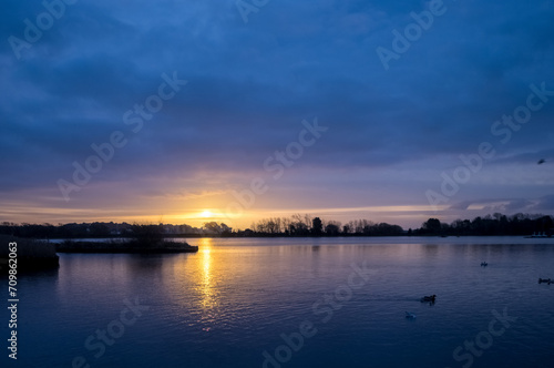 Beautiful sunrise on Poole Park lake