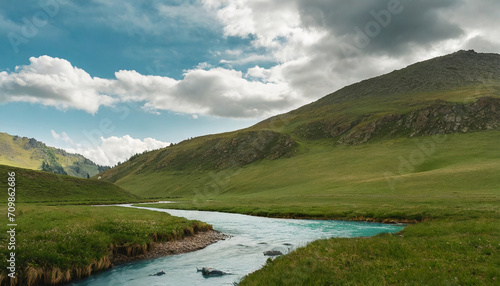 Minimalist landscape with a mountain stream and a cloudy sky © richard
