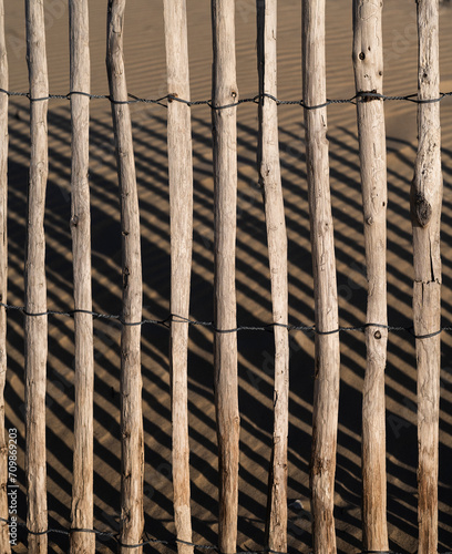 wooden fence with bars