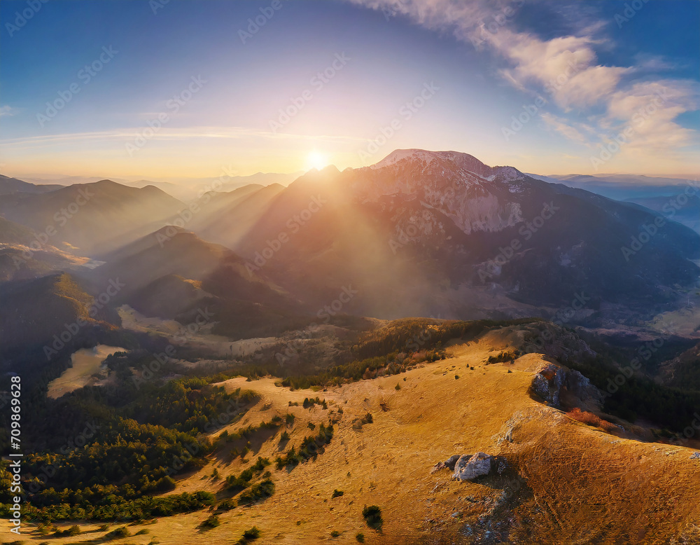 Fototapeta premium An epic sunrise in the mountains; aerial view; panorama landscape