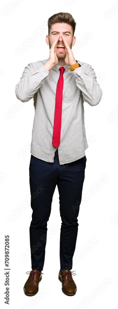 Young handsome business man Shouting angry out loud with hands over mouth Young handsome business man Shouting angry out loud with hands over mouth