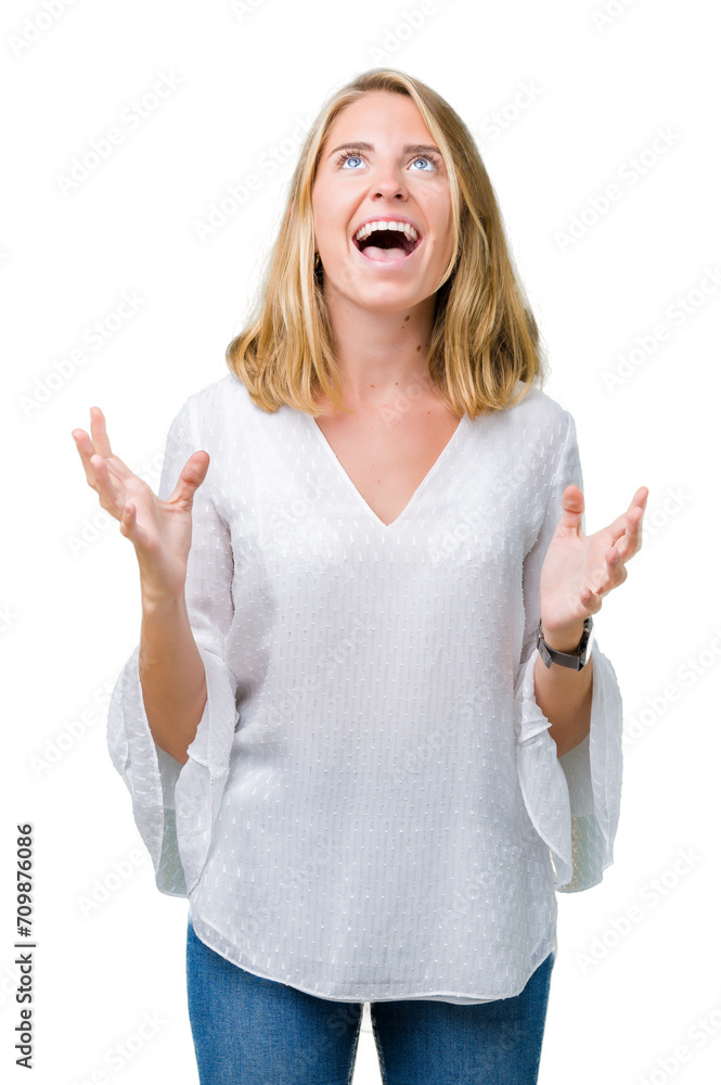 Beautiful young elegant woman over isolated background crazy and mad shouting and yelling with aggressive expression and arms raised. Frustration concept. Beautiful young elegant woman over isolated background crazy and mad shouting and yelling with aggressive expression and arms raised. Frustration concept.