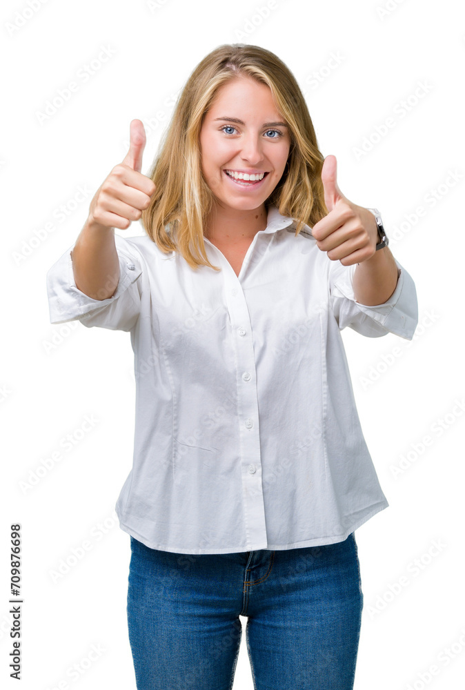 Beautiful young business woman over isolated background approving doing positive gesture with hand, thumbs up smiling and happy for success. Looking at the camera, winner gesture. Beautiful young business woman over isolated background approving doing positive gesture with hand, thumbs up smiling and happy for success. Looking at the camera, winner gesture.